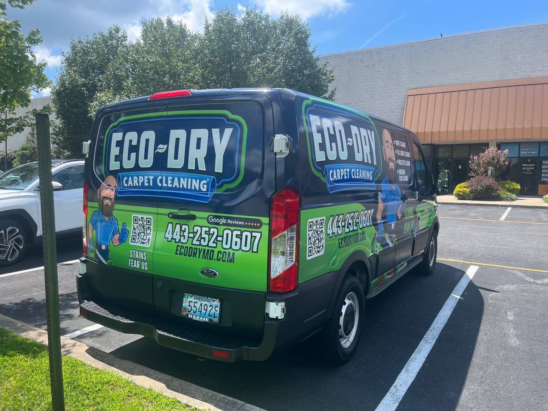 Rear and side view of the branded Eco-Dry van