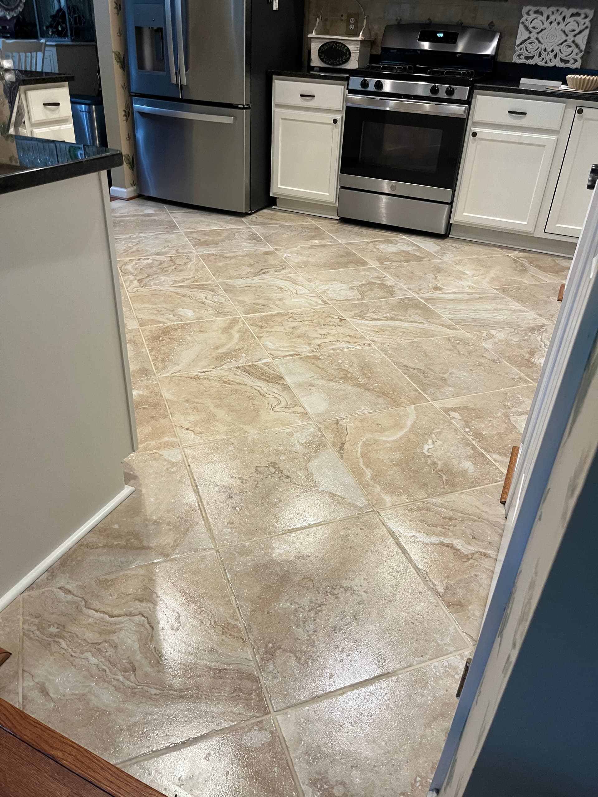 Tile and grout across a kitchen floor
