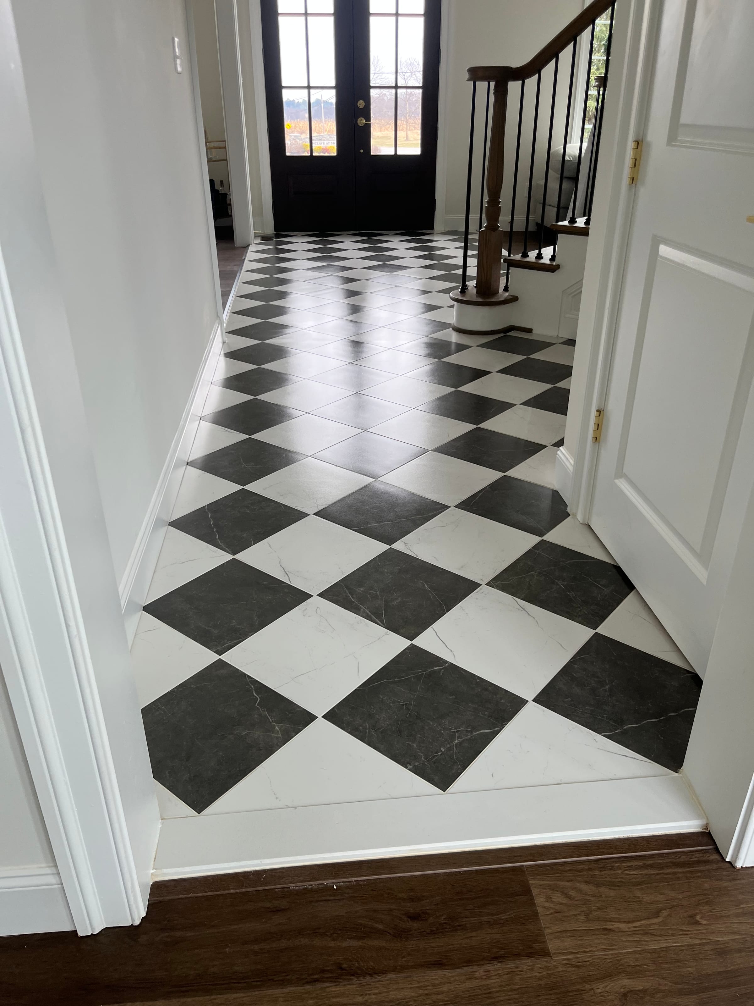 Clean tile floor after professional grout cleaning in a Baltimore area home